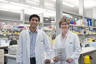 Dr Bhupinder Pal and Professor Jane Visvader standing in a laboratory