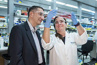 Smiling researcher and consumer buddy